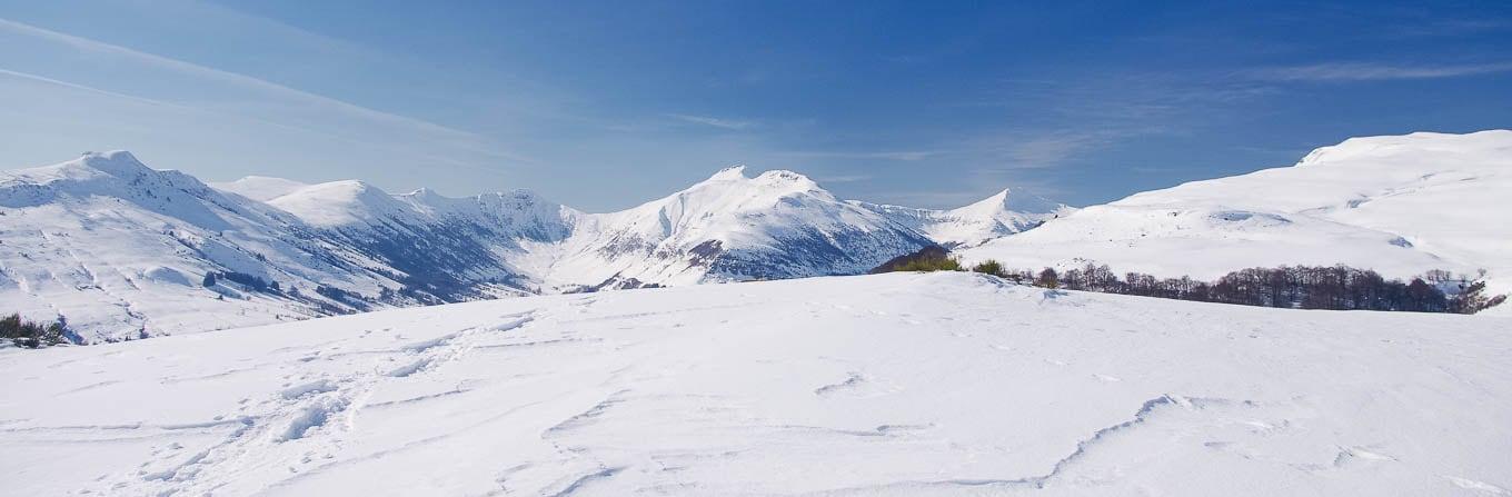 Voyage en raquette - Charme hivernal du Cantal